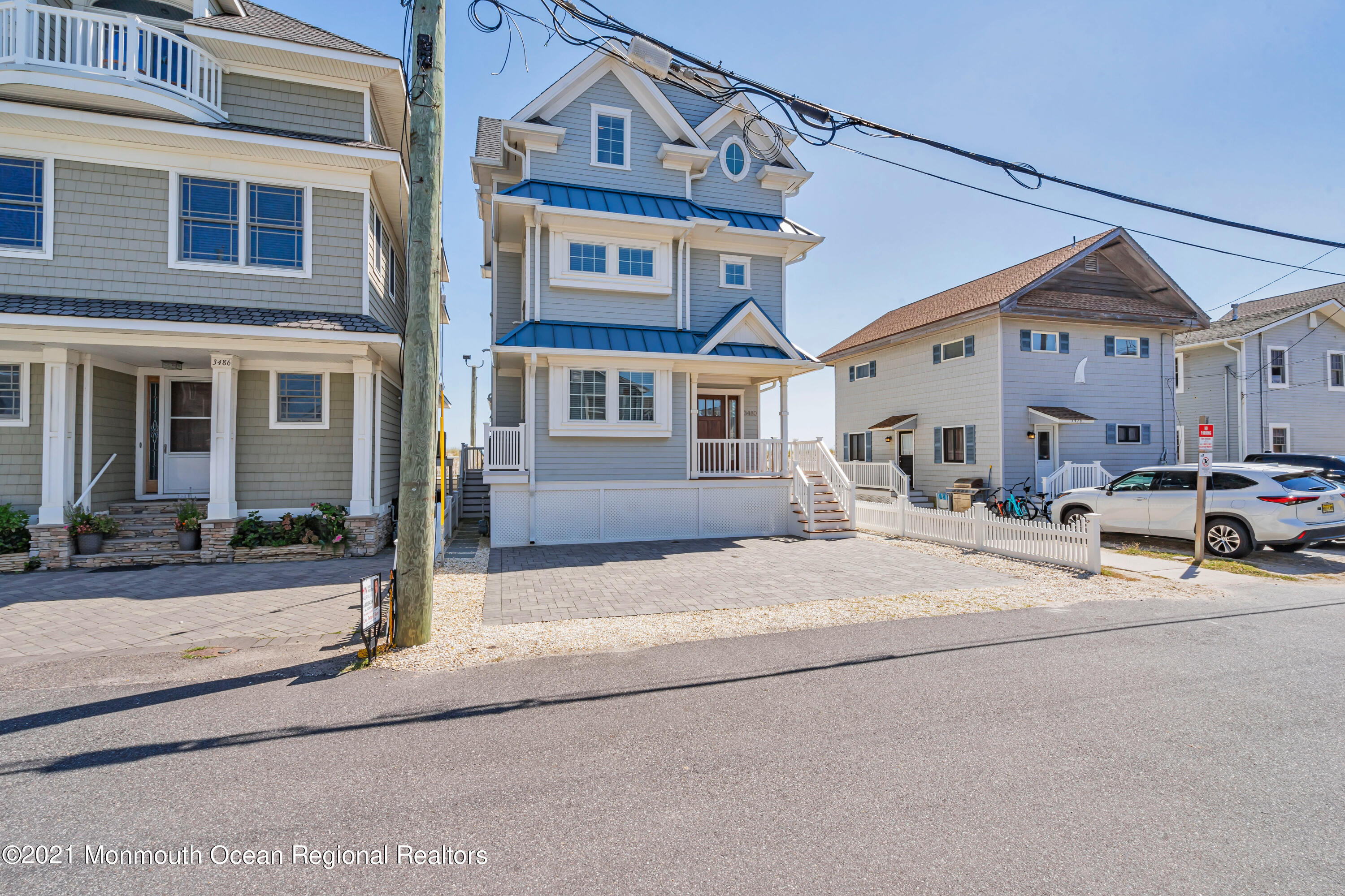 3480 Ocean Road Lavallette, NJ 08735 - Photo 37 of 83 a front view of a building with cars parked