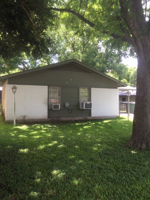 119 Lightsey Road Austin, TX 78704 - Photo 1 of 1 a backyard of a house with lots of green space