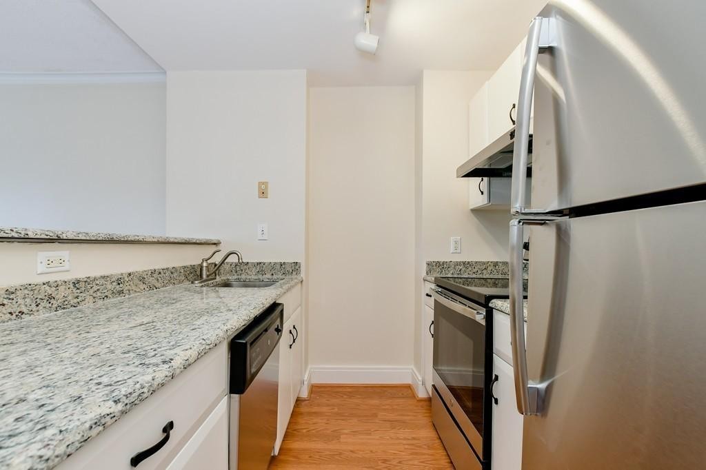 534 Beacon Street, Unit 502 Boston, MA 02215 - Photo 2 of 18 a view of a kitchen from a sink
