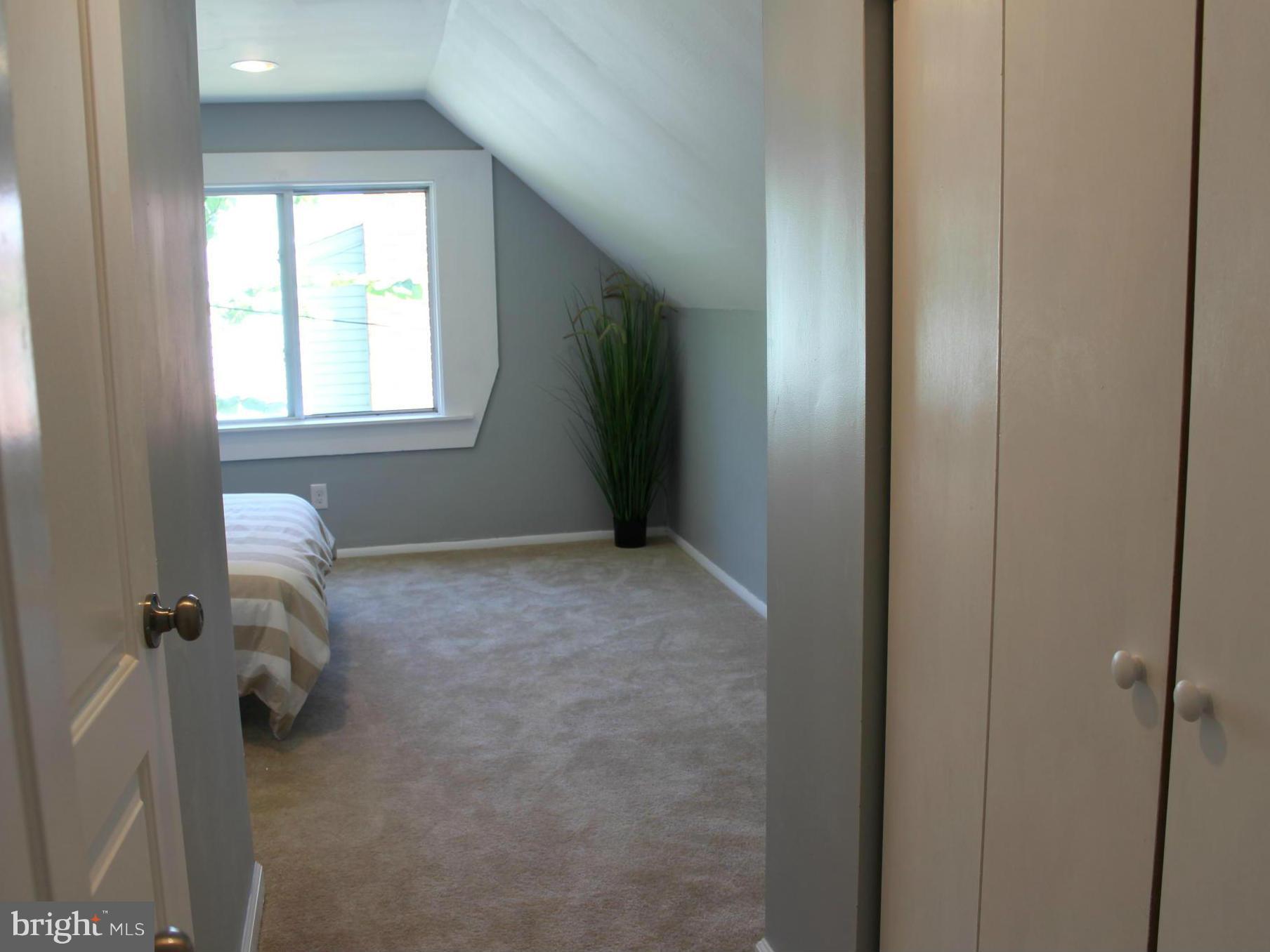 3508 Wild Cherry Road Baltimore, MD 21244 - Photo 22 of 25 a room that has a window in it