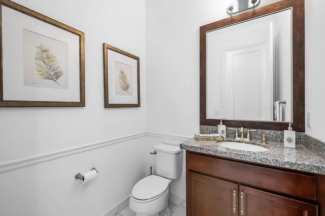 a aerial view of a house with a yard