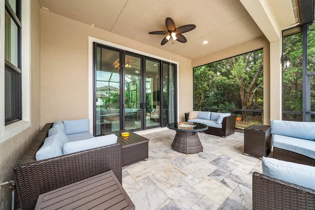 an aerial view of residential houses with outdoor space and street view