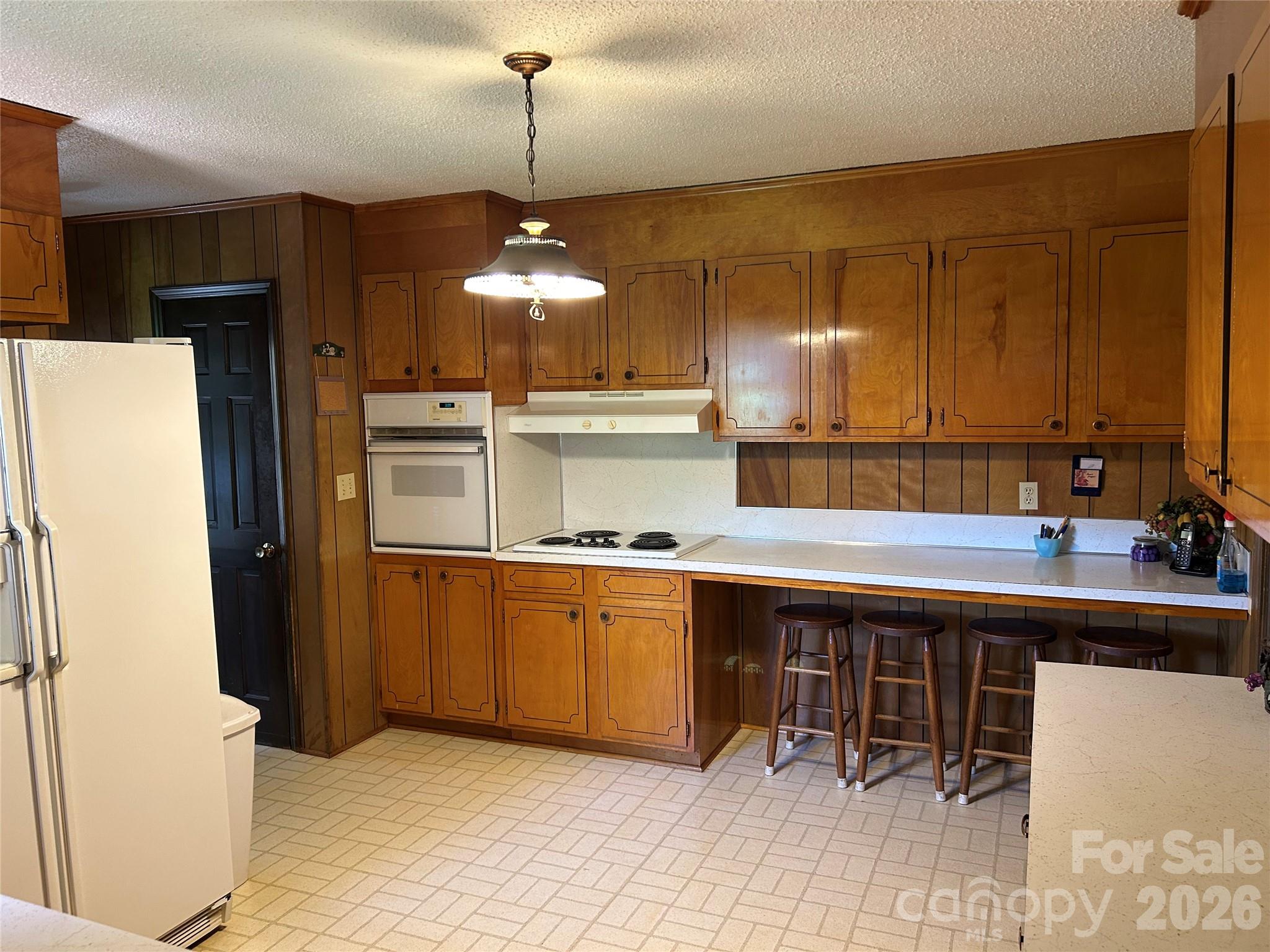 336 Bridges Road Blacksburg, SC 29702 - Photo 5 of 26 a kitchen with stainless steel appliances granite countertop a sink and a refrigerator