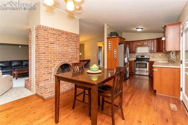 swimming pool view with a seating space
