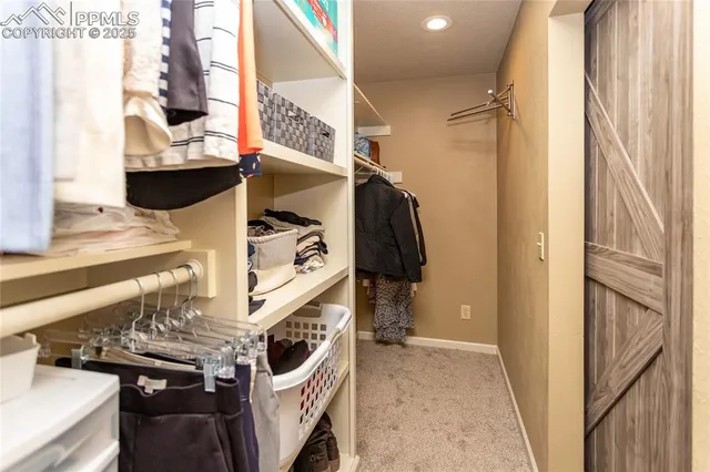 a room with a window and a bath tub