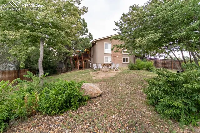 a view of porch with green space
