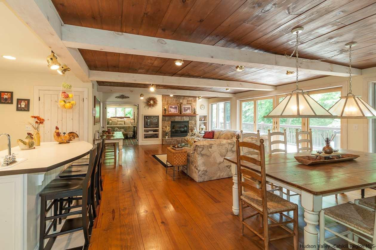 276 Krum Road Kerhonkson, NY 12446 - Photo 18 of 34 a view of a dining room with furniture and wooden floor