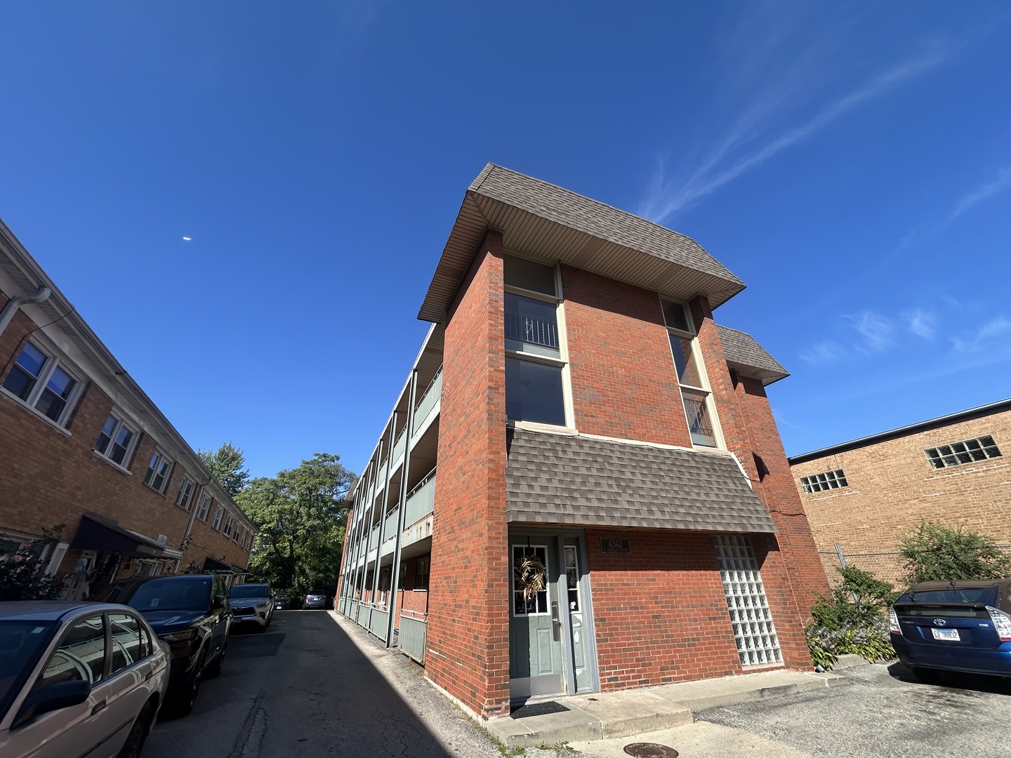 4342 North Kedvale Avenue, Unit 2A Chicago, IL 60641 - Photo 23 of 23 a front view of a house with parking