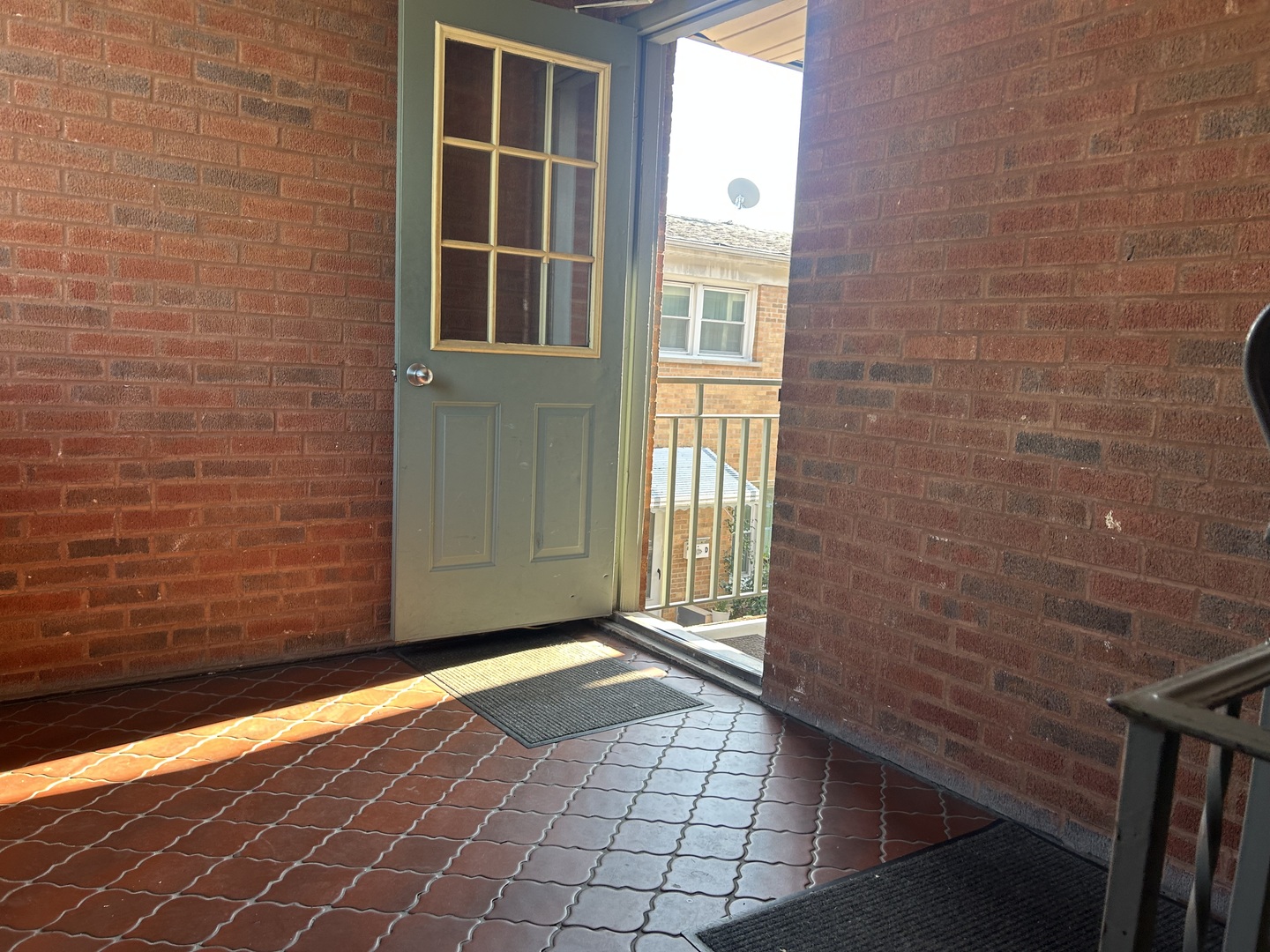 4342 North Kedvale Avenue, Unit 2A Chicago, IL 60641 - Photo 3 of 23 a view of a brick house with a large window