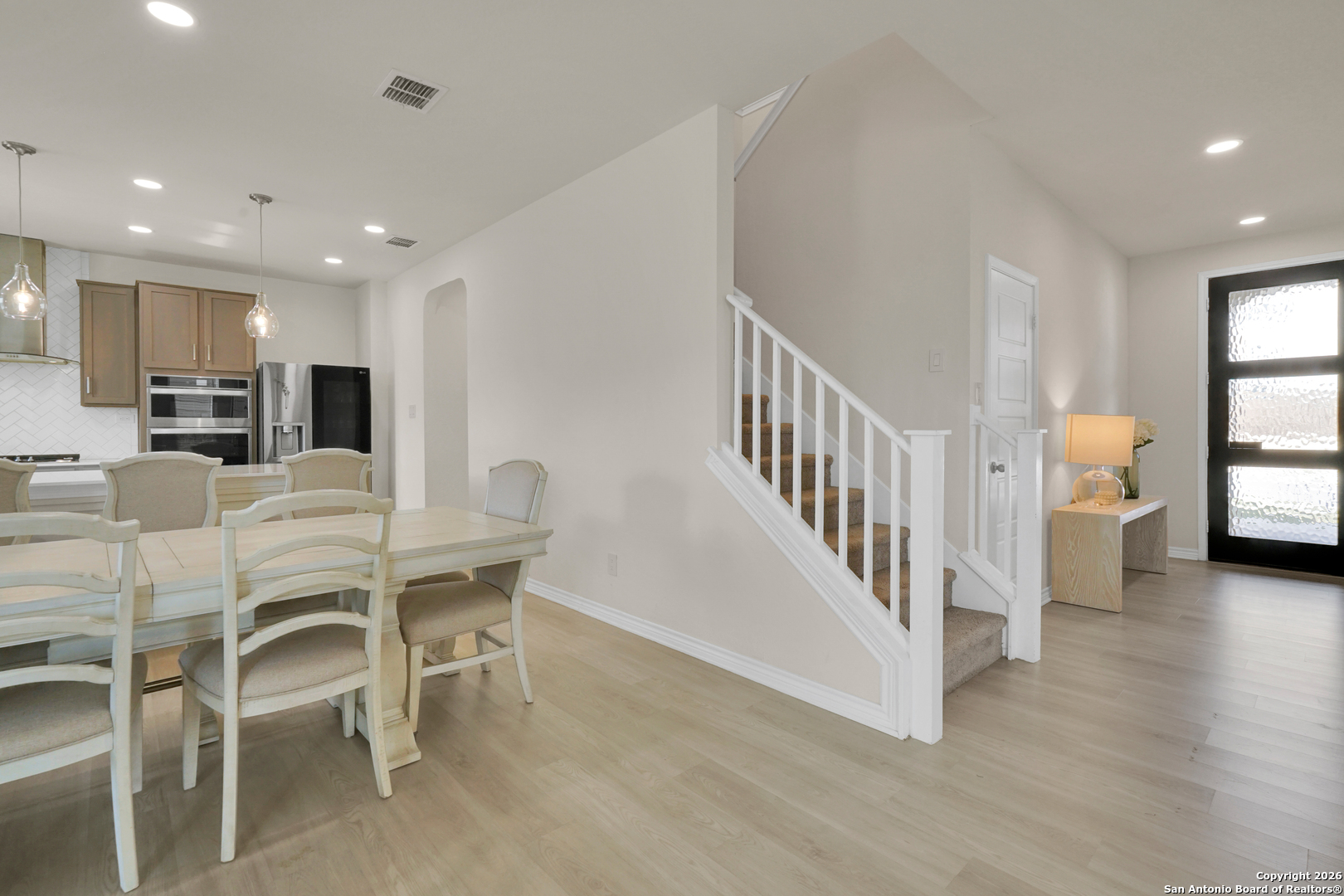 3634 Marvel Bulverde, TX 78163 - Photo 11 of 42 a view of a dining room with furniture and a kitchen