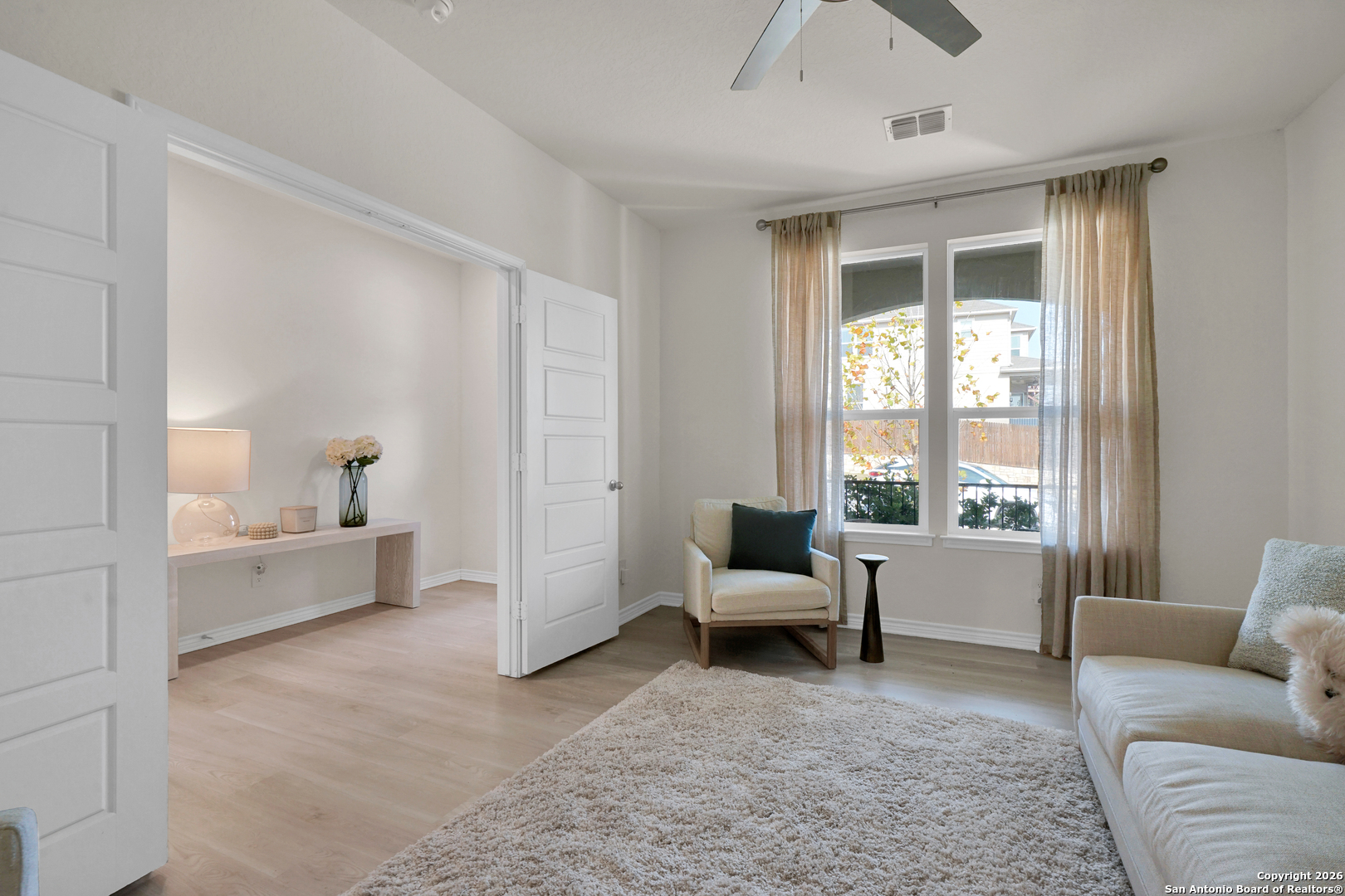 3634 Marvel Bulverde, TX 78163 - Photo 6 of 42 a living room with furniture and a large window