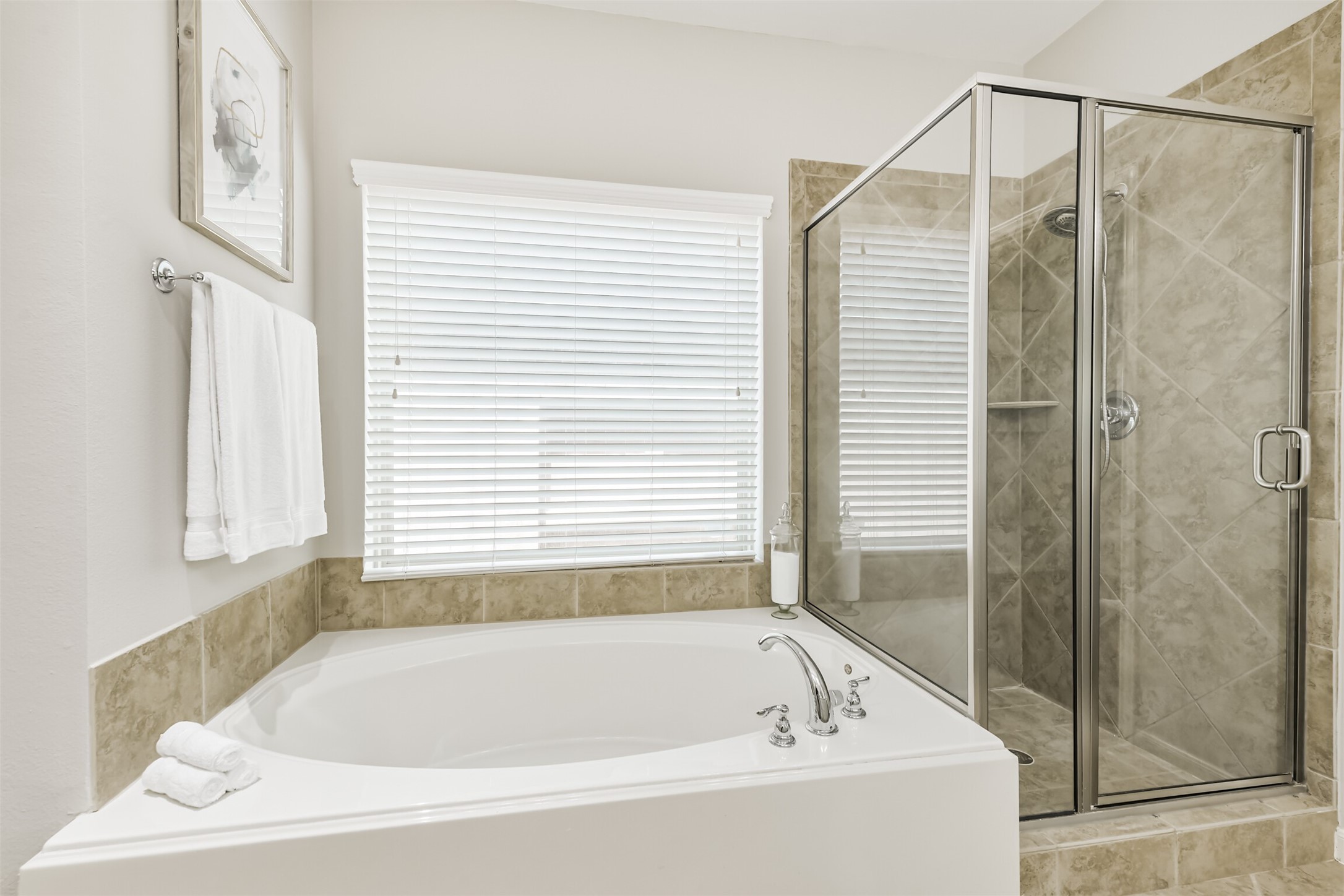 13519 Brant Grove Lane Houston, TX 77044 - Photo 25 of 49 a bathroom with a bathtub and shower