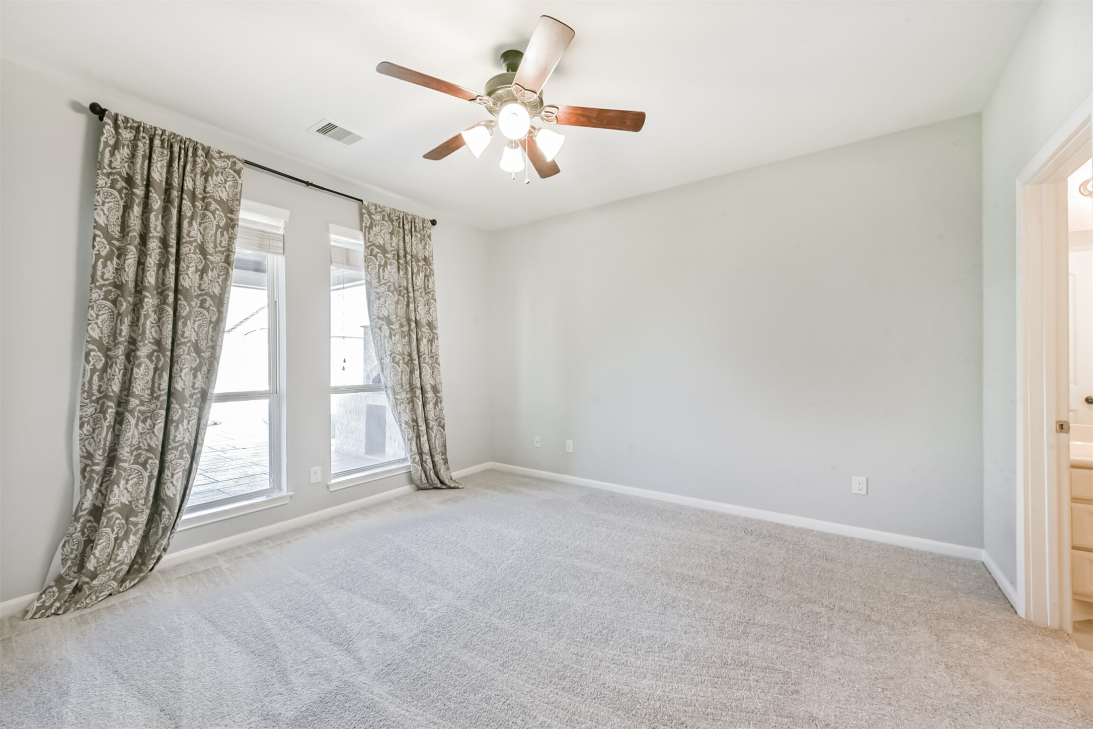 13519 Brant Grove Lane Houston, TX 77044 - Photo 26 of 49 a view of an empty room with a window