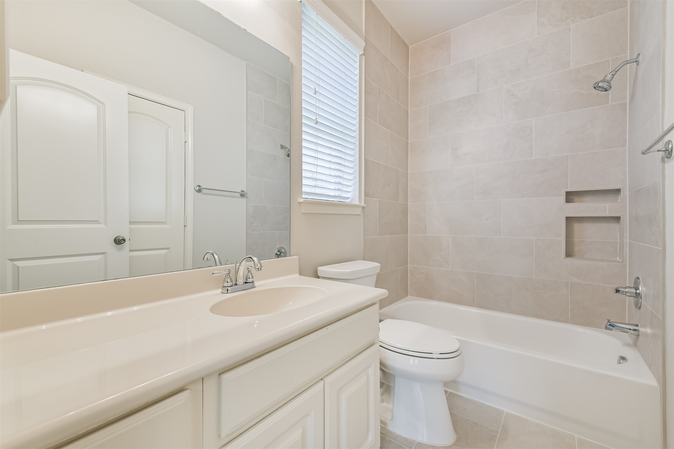 13519 Brant Grove Lane Houston, TX 77044 - Photo 28 of 49 a bathroom with a sink a toilet and shower