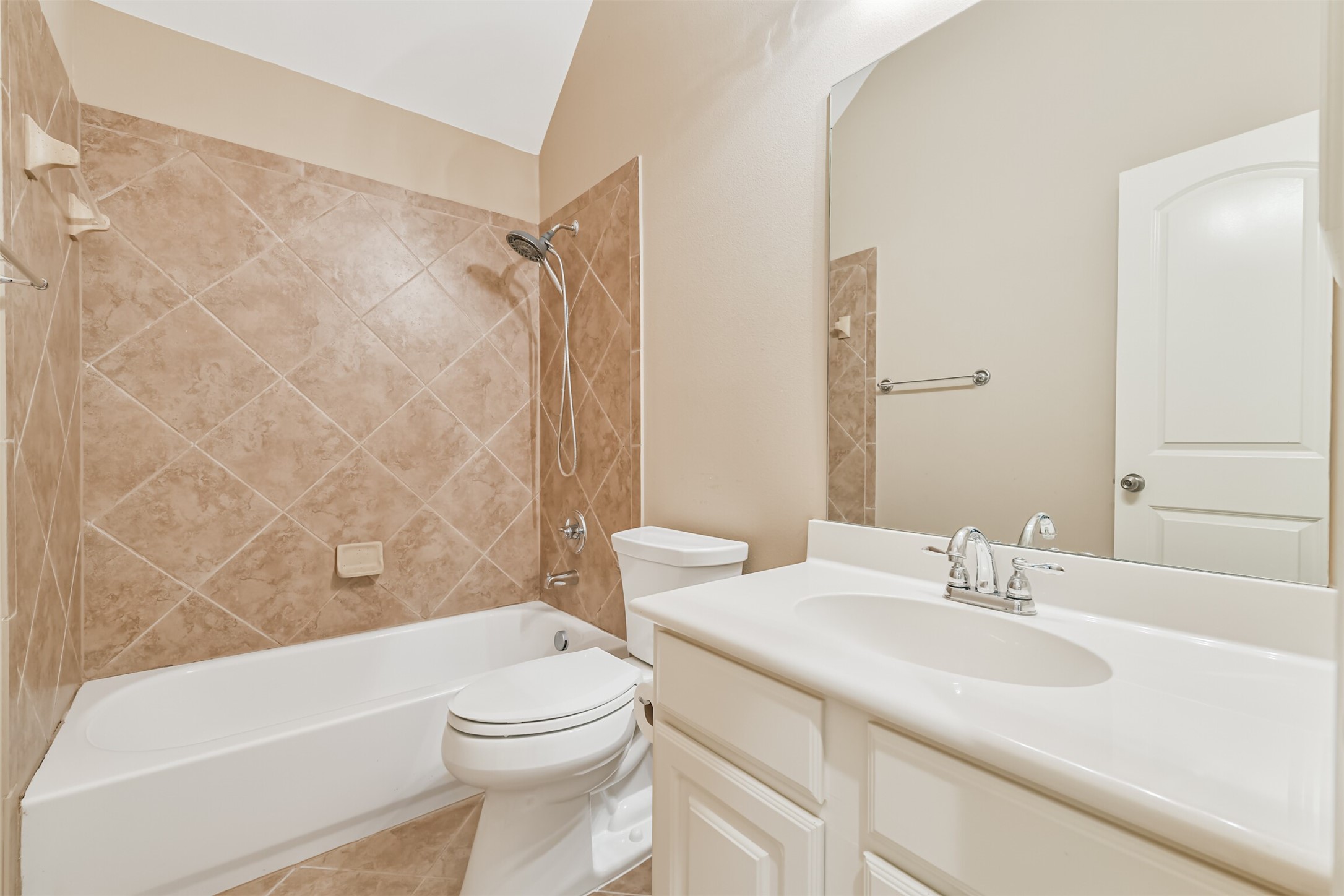 13519 Brant Grove Lane Houston, TX 77044 - Photo 33 of 49 a bathroom with a sink a toilet and a bathtub