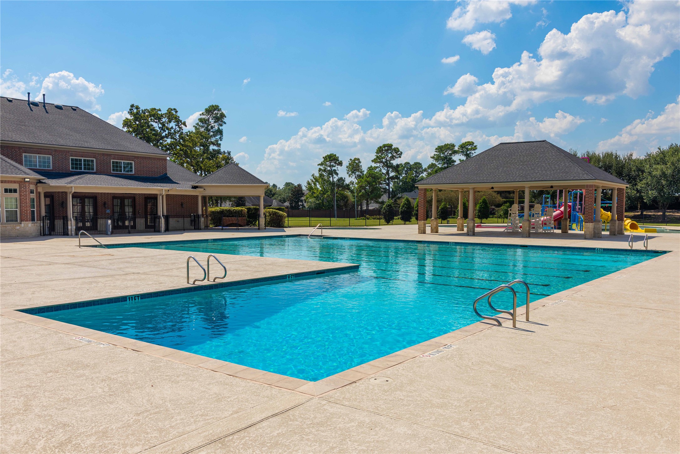 13519 Brant Grove Lane Houston, TX 77044 - Photo 42 of 49 a view of a swimming pool with an outdoor seating