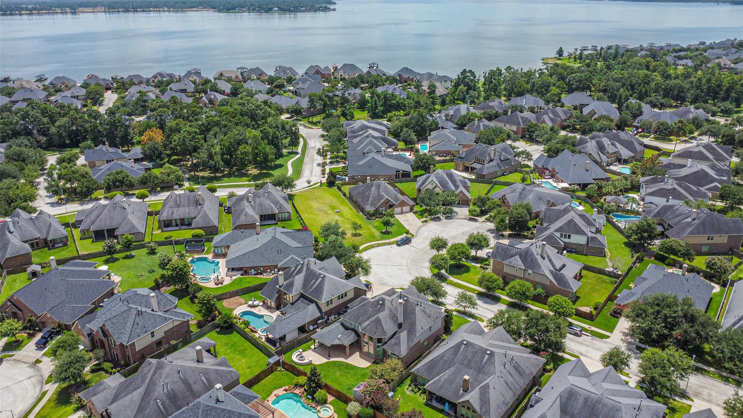 13519 Brant Grove Lane Houston, TX 77044 - Photo 47 of 49 a view of a house with a lake