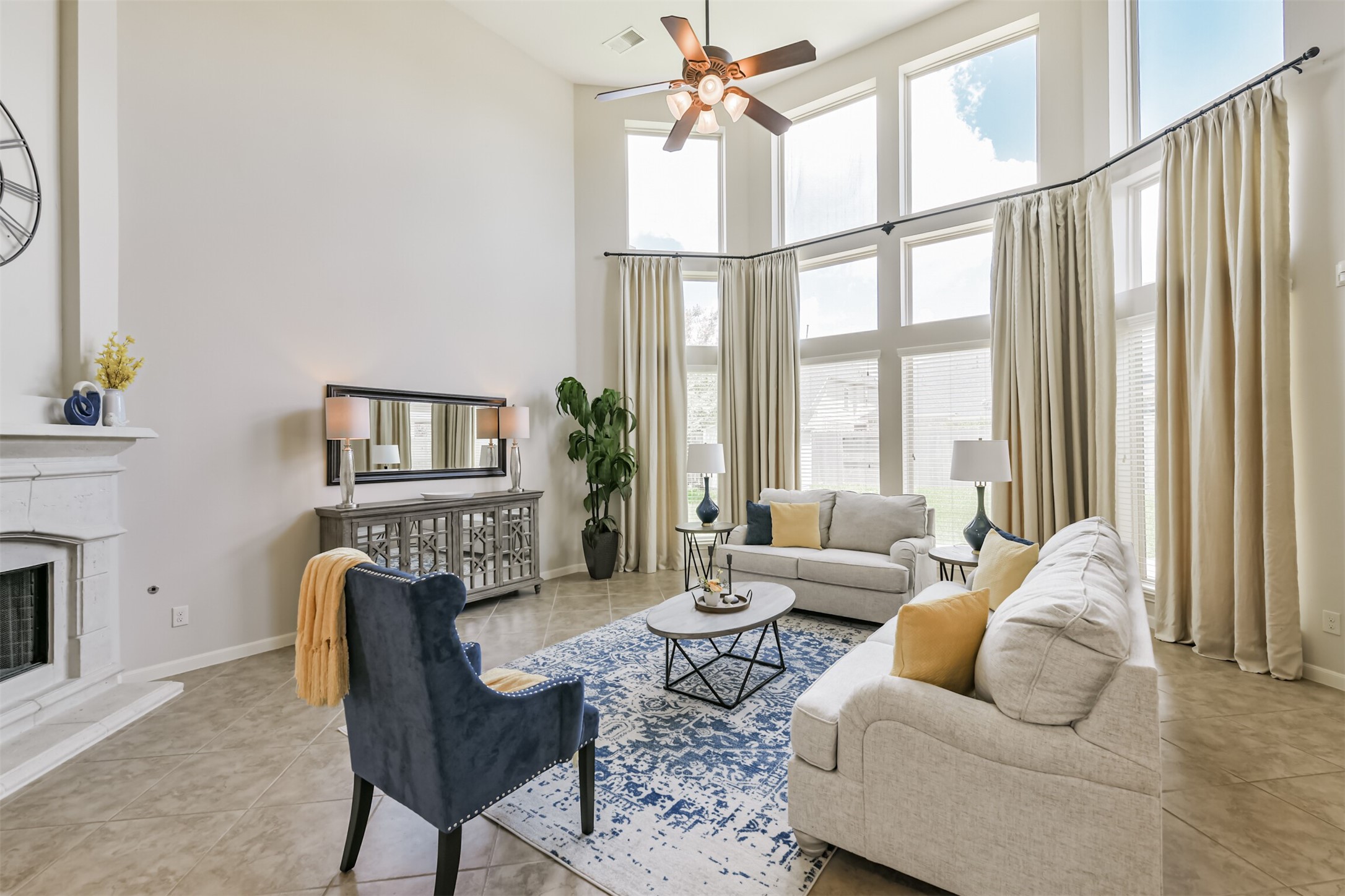 13519 Brant Grove Lane Houston, TX 77044 - Photo 7 of 49 a living room with furniture a flat screen tv and a large window
