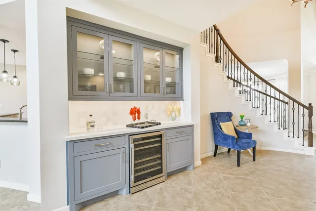 a view of a hallway with seating area