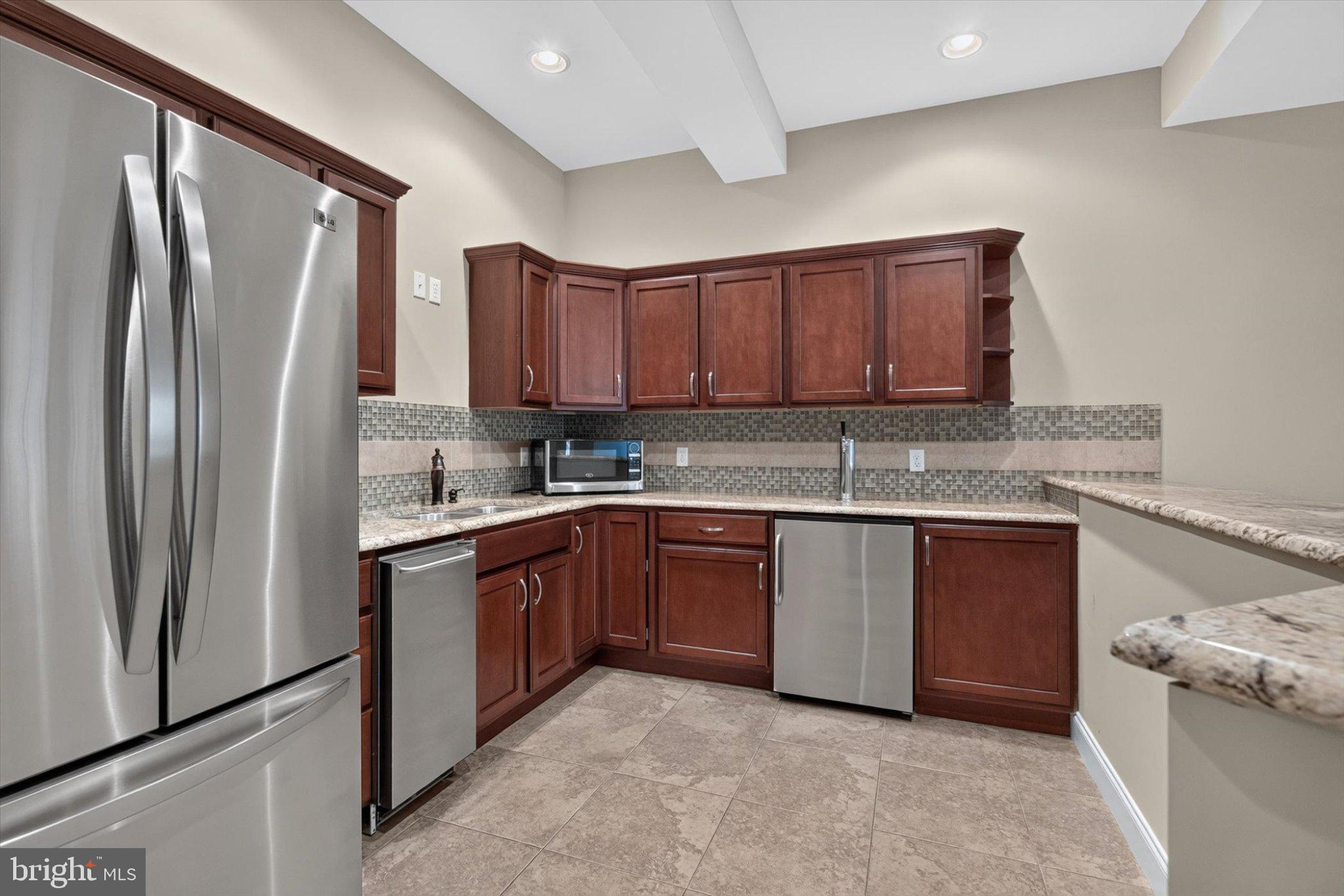 6505 Plowman Ridge Harrisburg, PA 17112 - Photo 48 of 83 Modern kitchen with rich cabinetry.