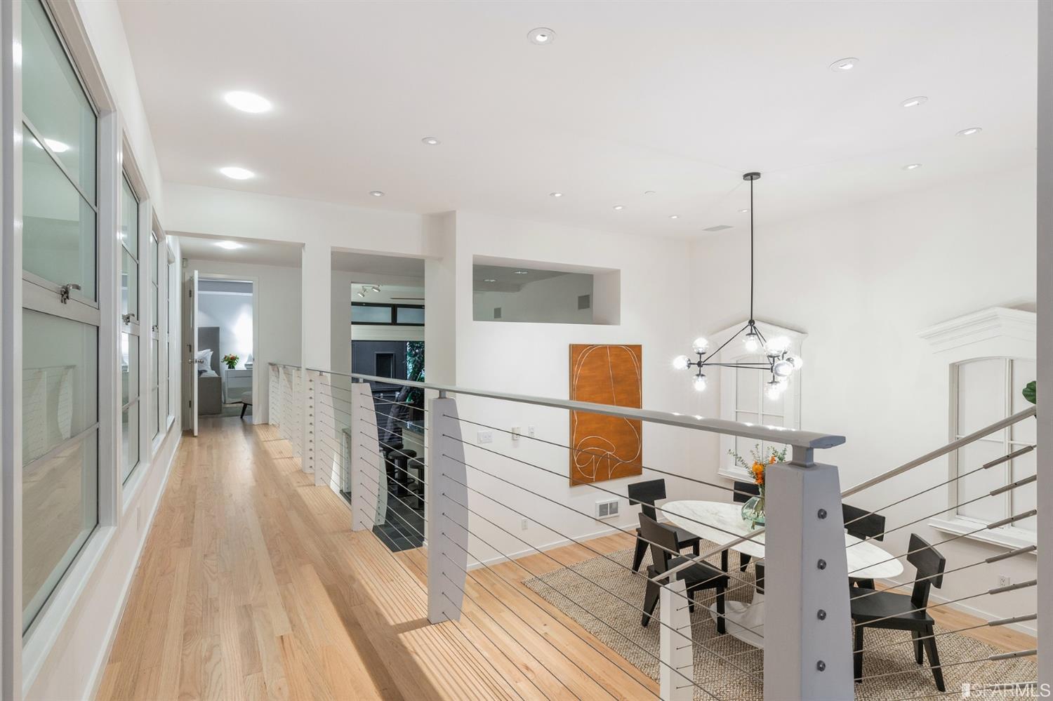 2 Fallon Place, Unit 15 San Francisco, CA 94133 - Photo 17 of 43 a very nice looking room with wooden floor and furniture