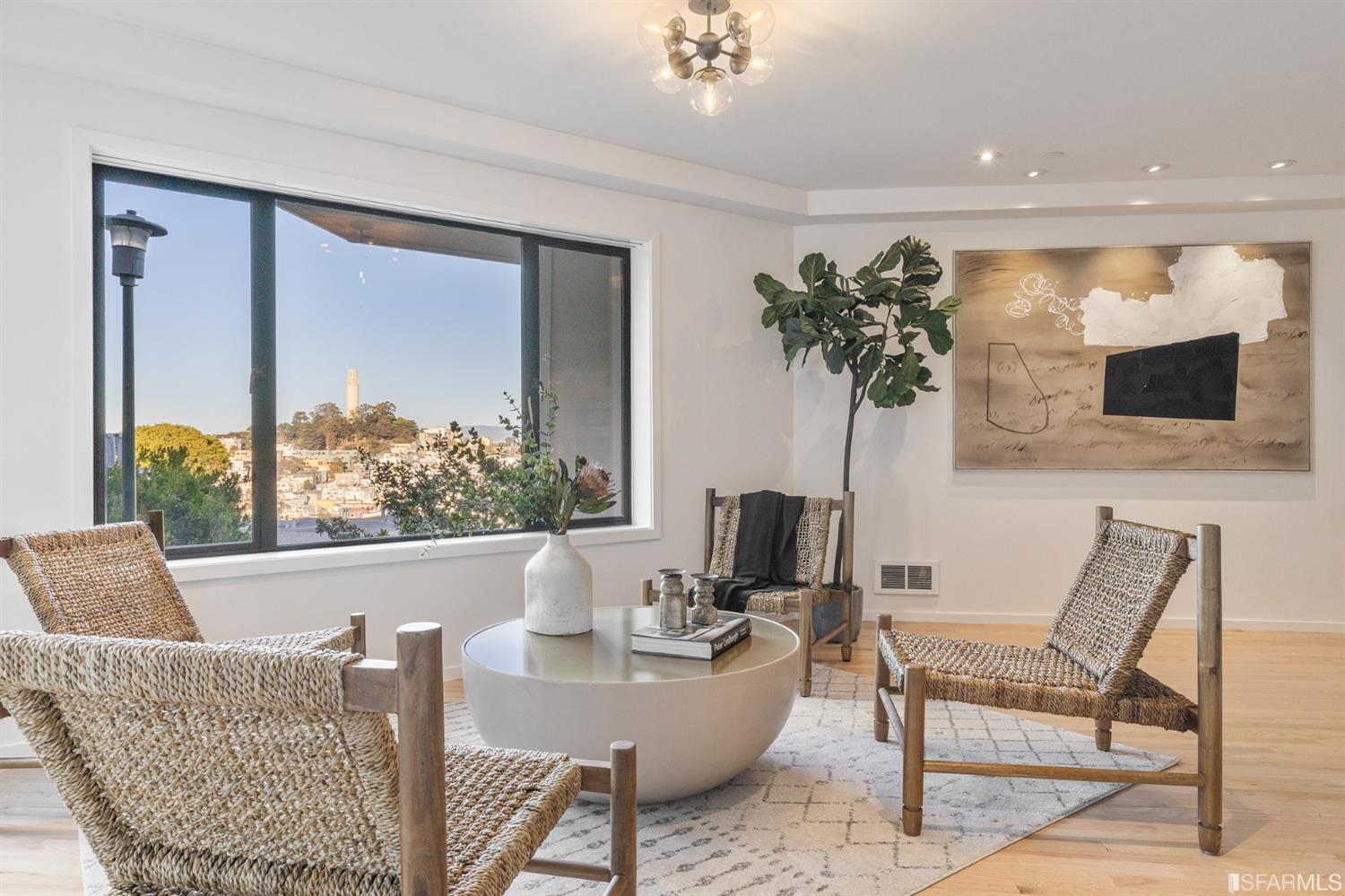 2 Fallon Place, Unit 15 San Francisco, CA 94133 - Photo 2 of 43 a living room with furniture and a potted plant