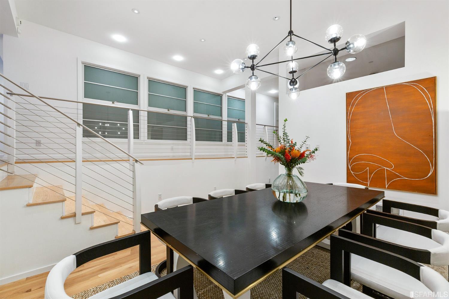 2 Fallon Place, Unit 15 San Francisco, CA 94133 - Photo 22 of 43 a view of a dining room with furniture and a window
