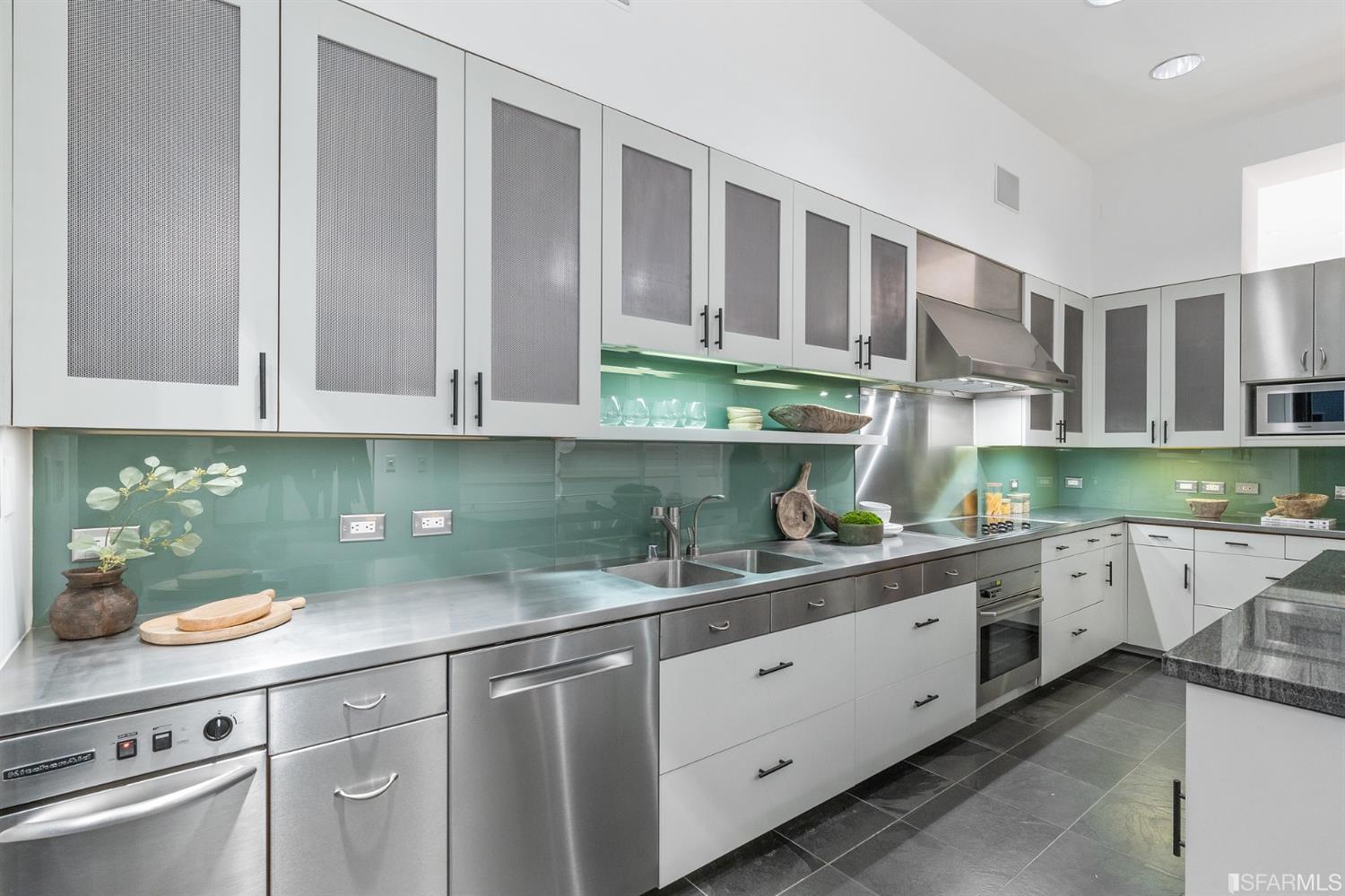 2 Fallon Place, Unit 15 San Francisco, CA 94133 - Photo 26 of 43 a kitchen with stainless steel appliances granite countertop a sink and cabinets