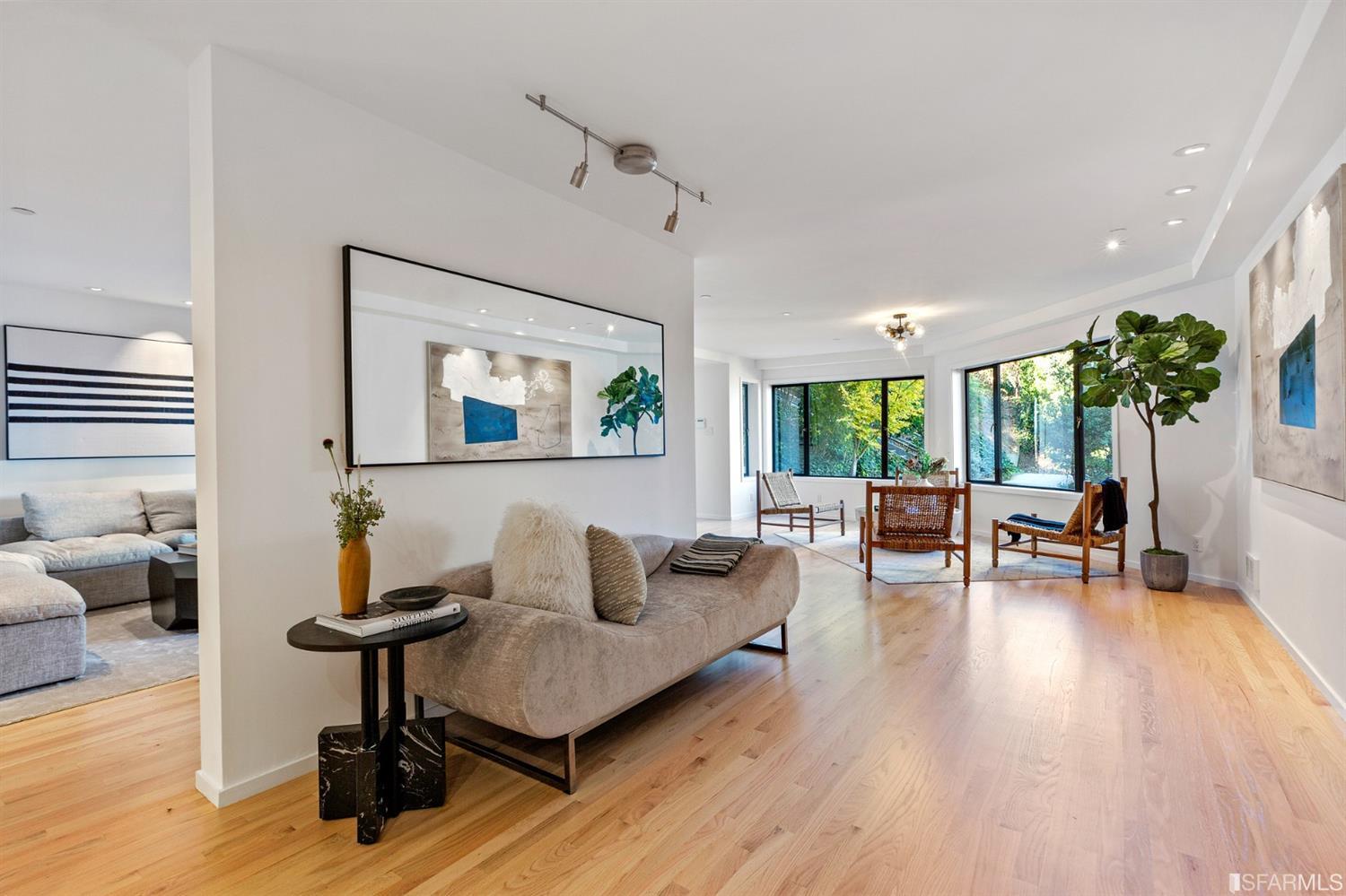 2 Fallon Place, Unit 15 San Francisco, CA 94133 - Photo 10 of 43 a living room with furniture and a wooden floor