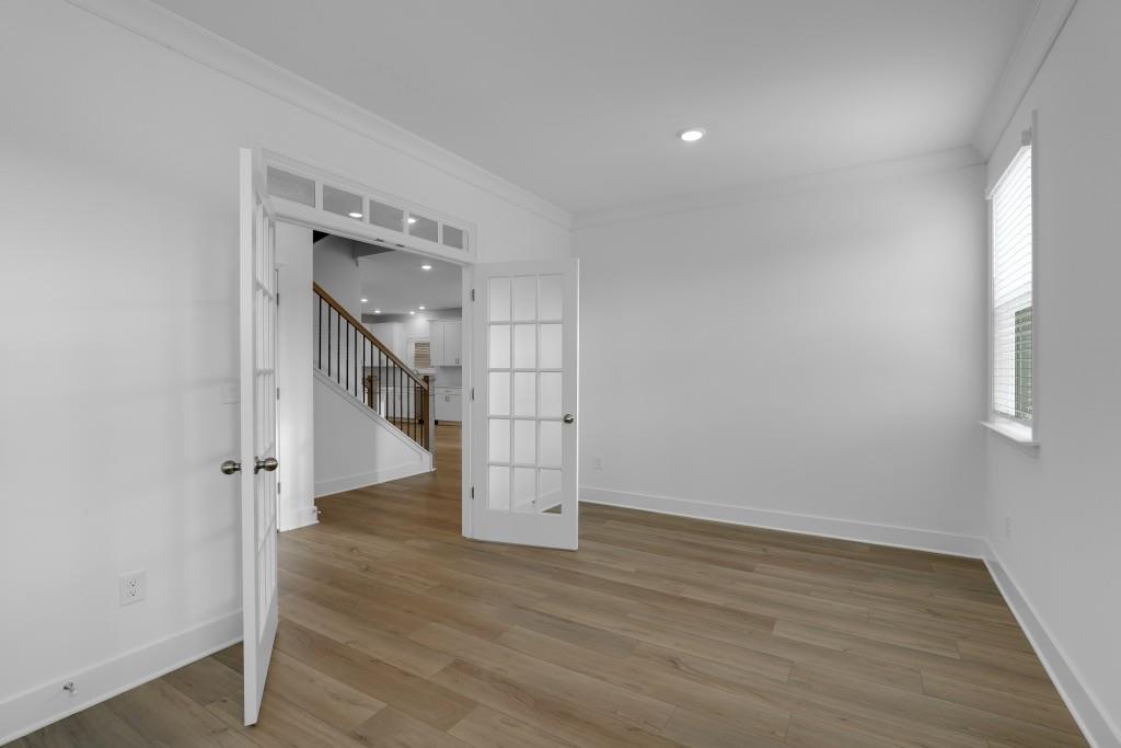 1011 Reagan Drive Madison, GA 30650 - Photo 11 of 40 a view of entryway with wooden floor