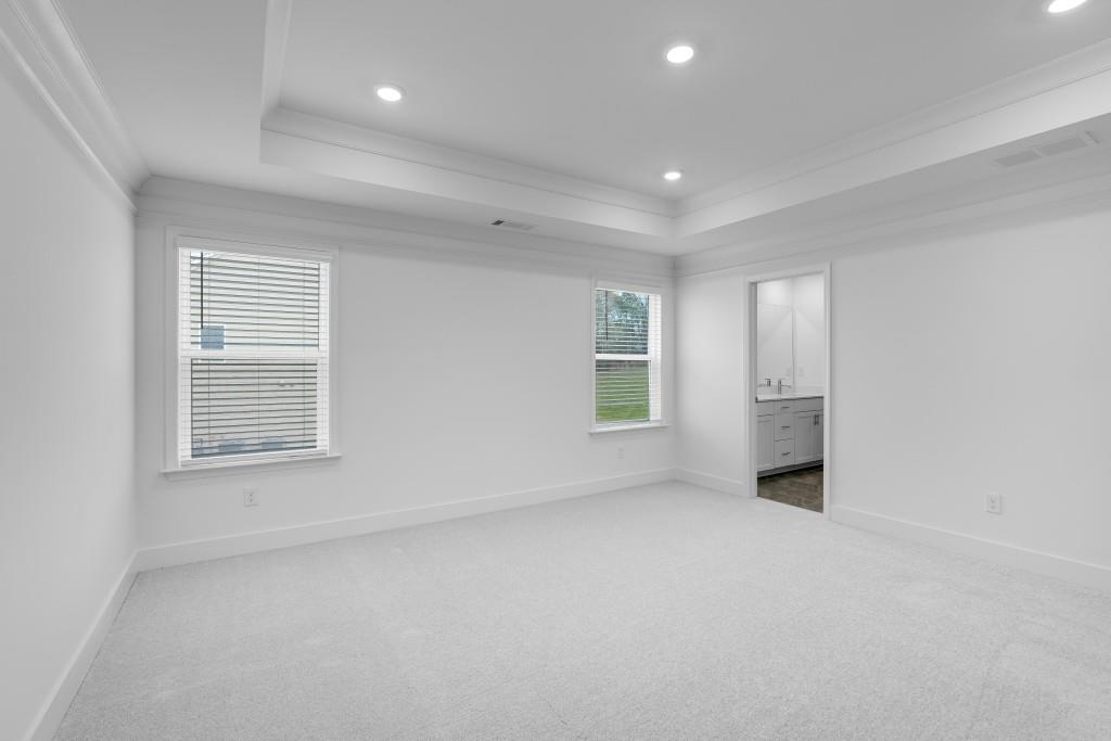 1011 Reagan Drive Madison, GA 30650 - Photo 30 of 40 an empty room with windows