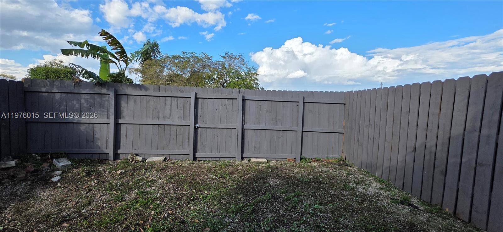 11321 Southwest 65th Street Miami, FL 33173 - Photo 23 of 24 a view of a backyard