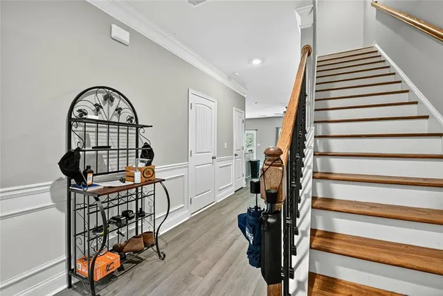 a view of entryway with wooden floor