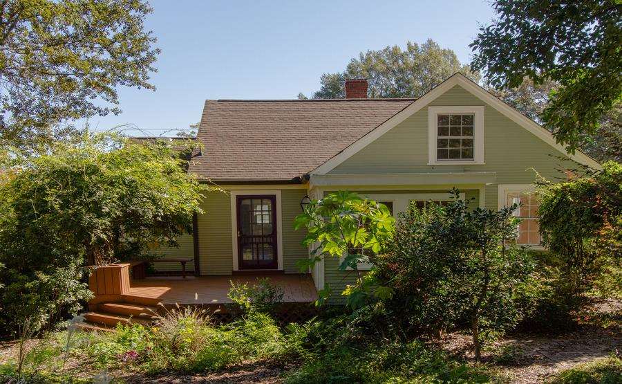 400 Perry Street Raleigh, NC 27608 - Photo 20 of 22 a front view of a house with garden