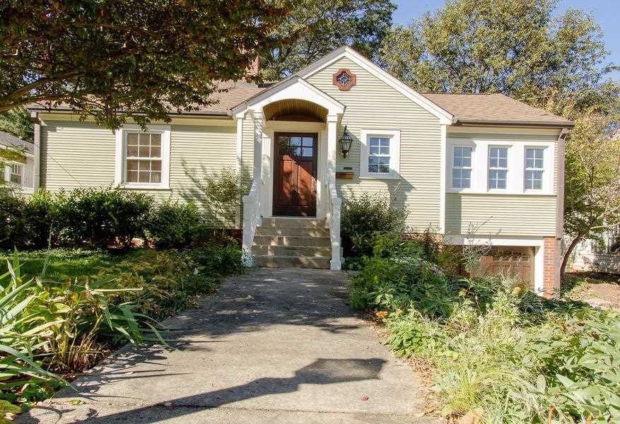 400 Perry Street Raleigh, NC 27608 - Photo 2 of 22 a front view of a house with garden