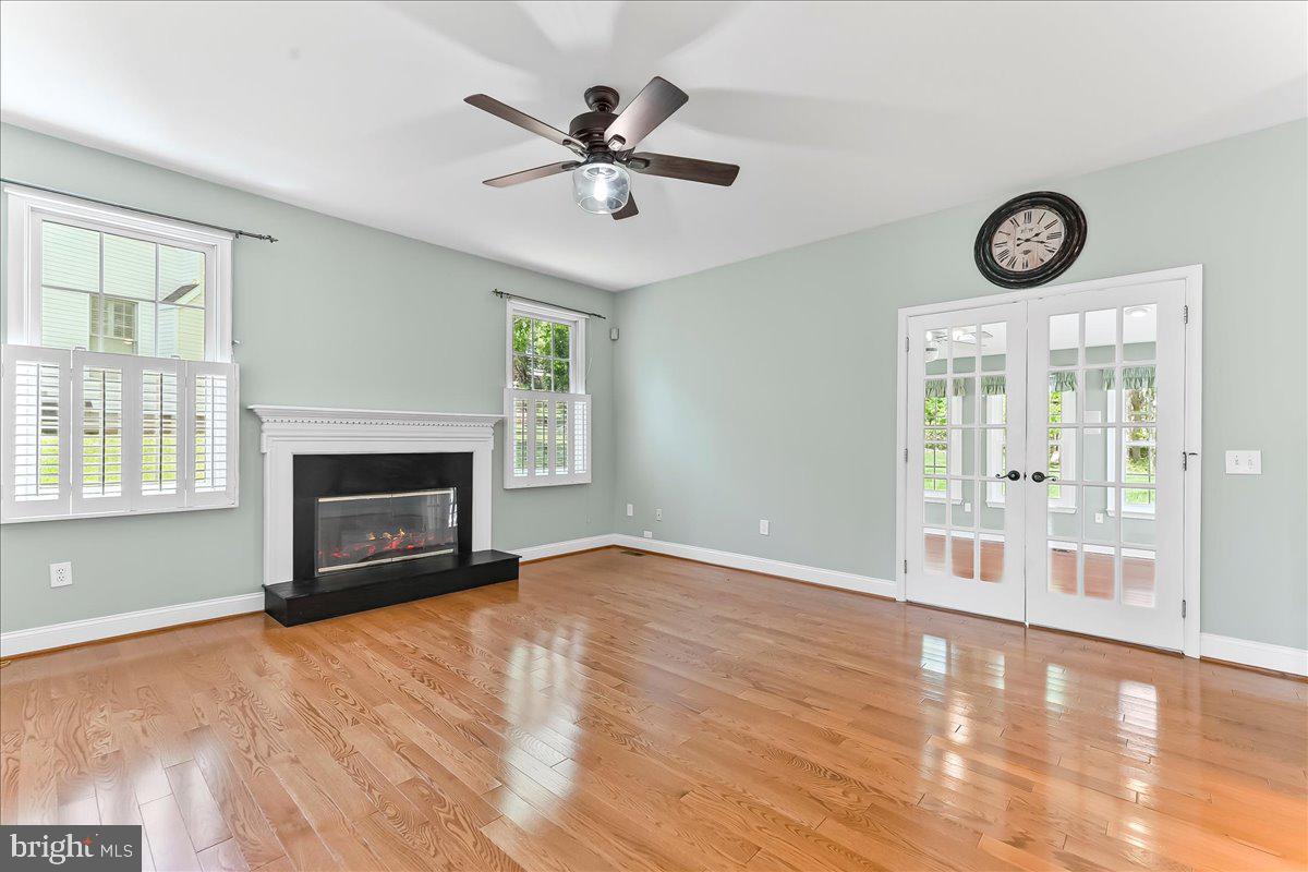 233 Chaingate Circle Landenberg, PA 19350 - Photo 13 of 31 a view of an empty room with window and fireplace