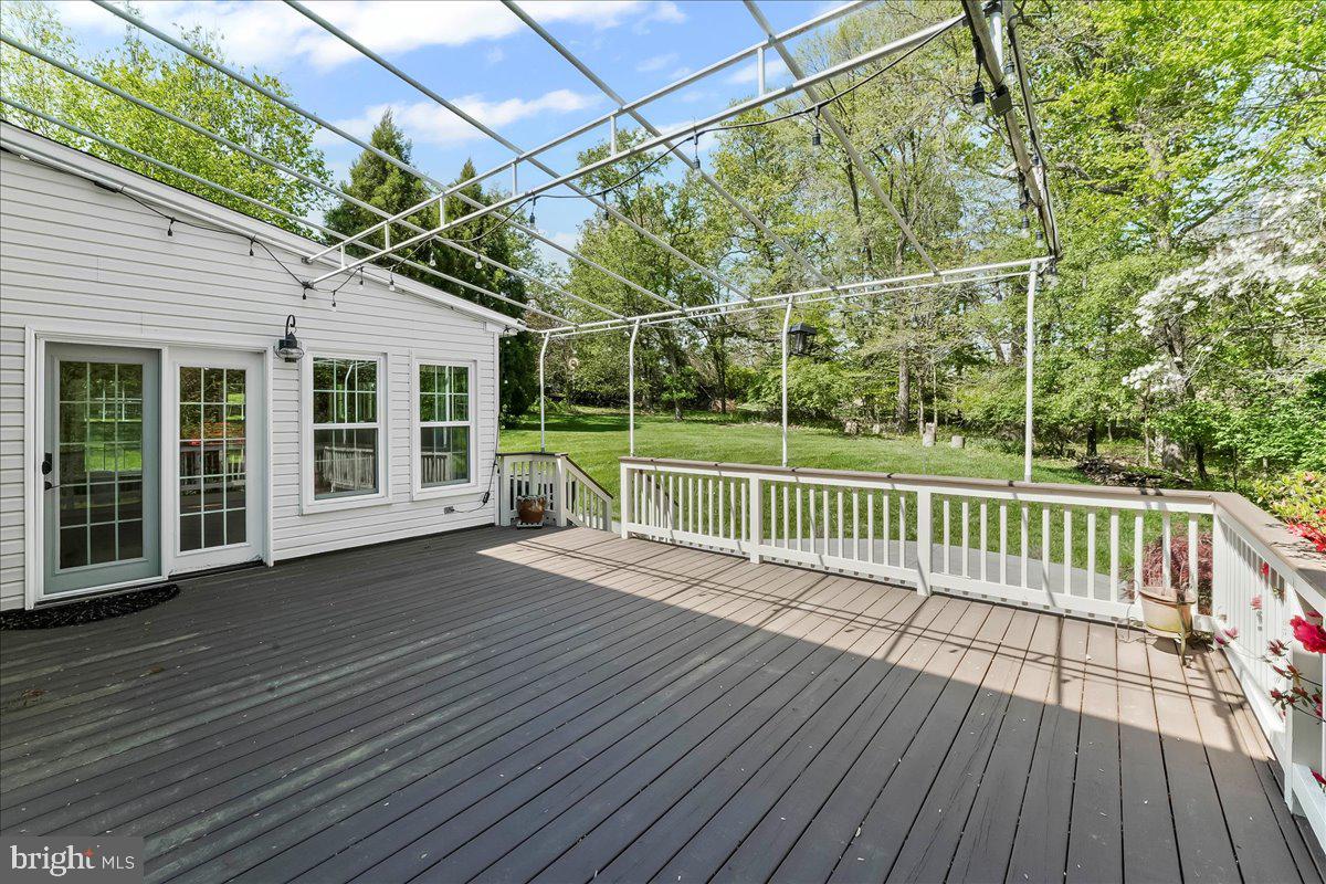 233 Chaingate Circle Landenberg, PA 19350 - Photo 26 of 31 a view of a backyard with wooden floor and fence
