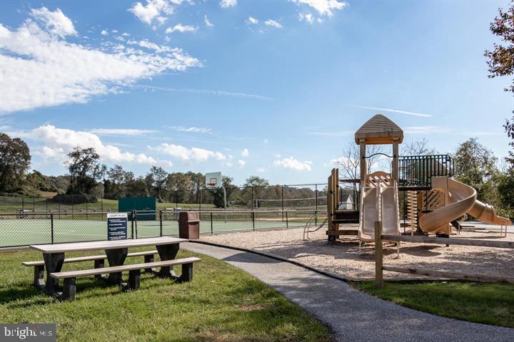 233 Chaingate Circle Landenberg, PA 19350 - Photo 29 of 31 a view of a swimming pool with a bench and lake view