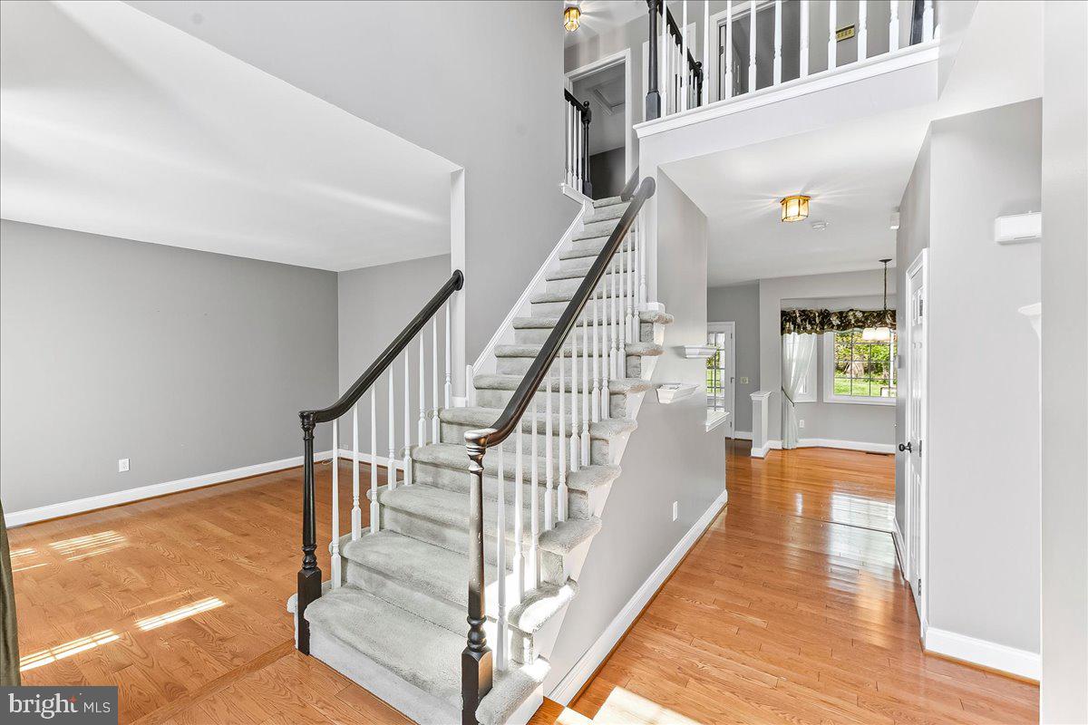 233 Chaingate Circle Landenberg, PA 19350 - Photo 3 of 31 a view of entryway and hall with wooden floor