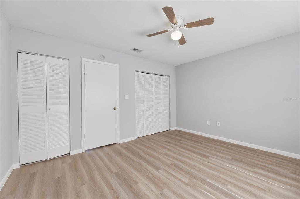 4799 Sisson Road Titusville, FL 32780 - Photo 21 of 23 wooden floor in an empty room