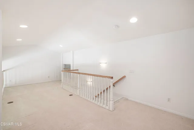 a view of a room with stairs