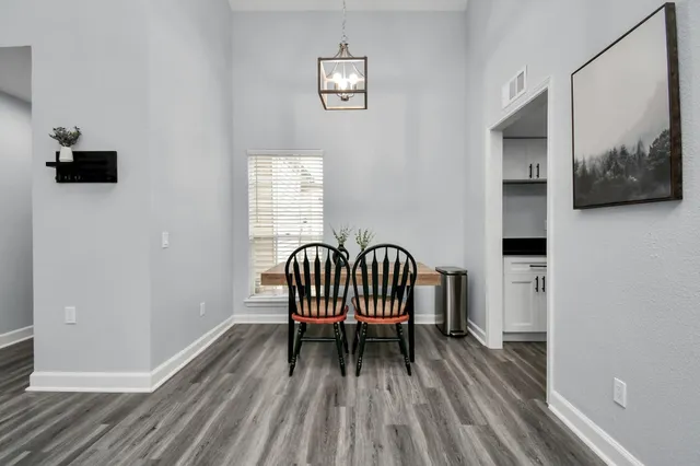 a view of entryway with wooden floor