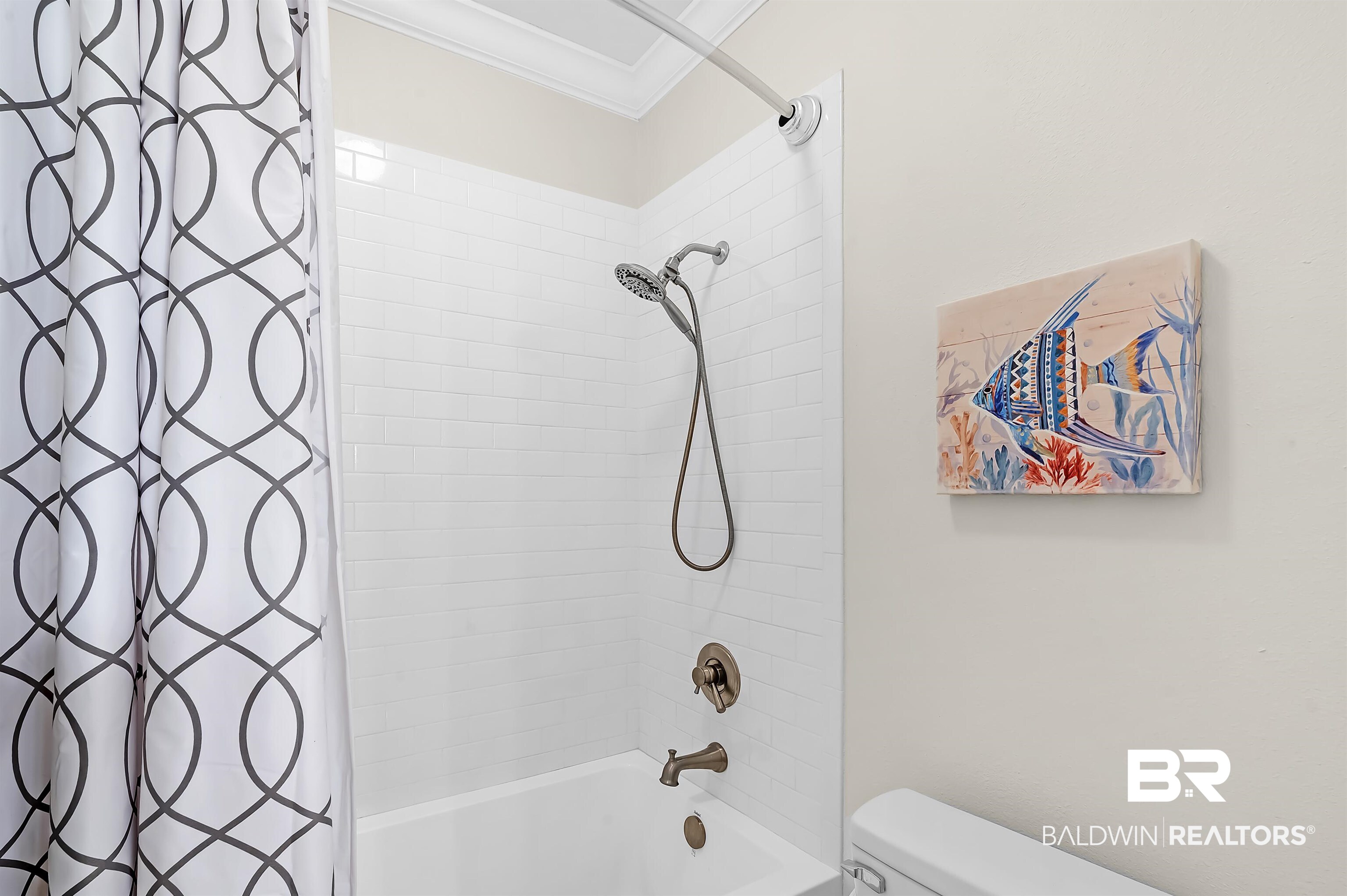 8915 Bay Point Drive Elberta, AL 36530 - Photo 37 of 74 Full bathroom with crown molding, toilet, and shower / tub combo with curtain