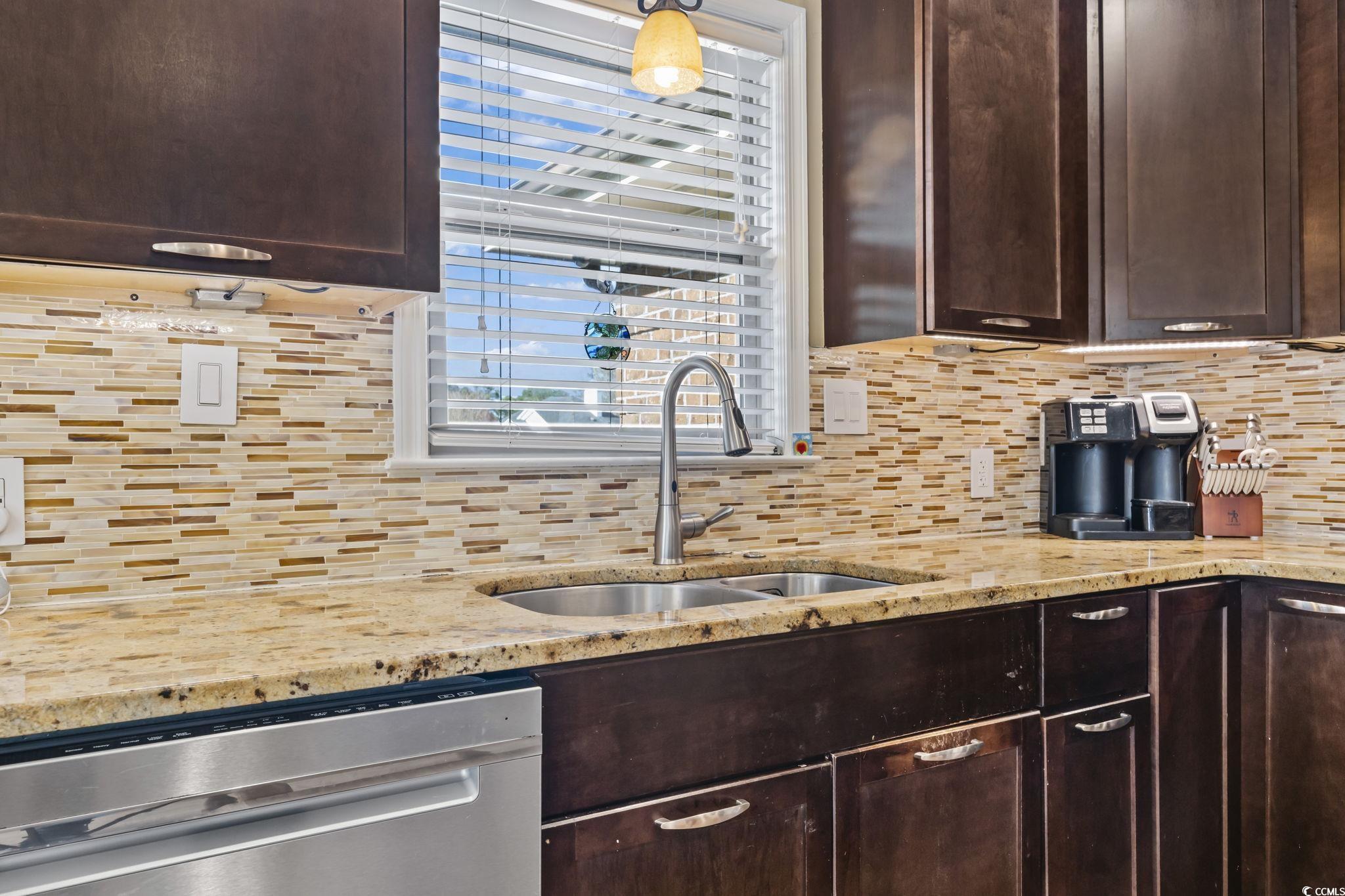 1671 Arundel Road Myrtle Beach, SC 29577 - Photo 23 of 40 Kitchen featuring sink, stainless steel dishwasher