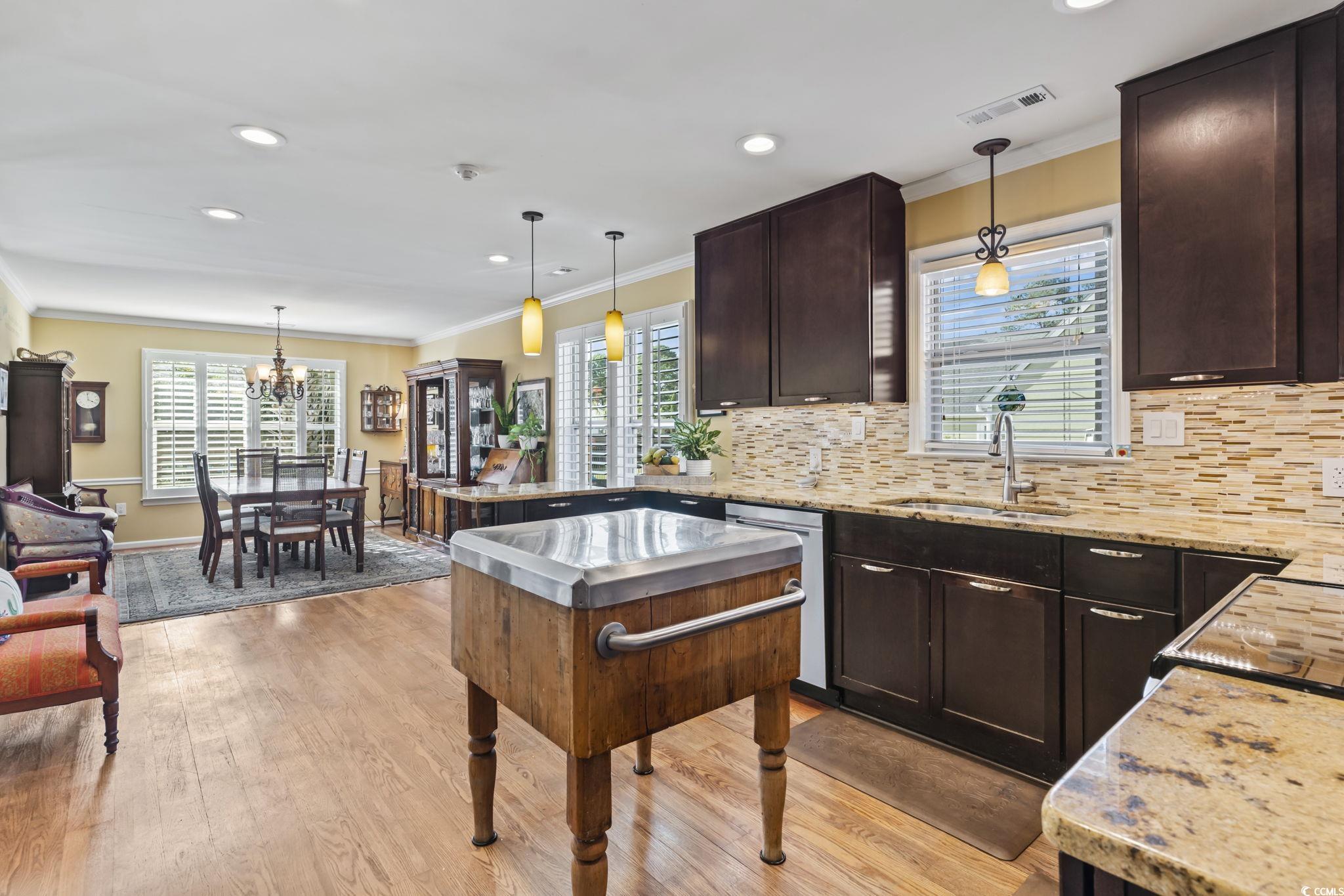 1671 Arundel Road Myrtle Beach, SC 29577 - Photo 25 of 40 Kitchen with sink, light wood-type flooring, and h