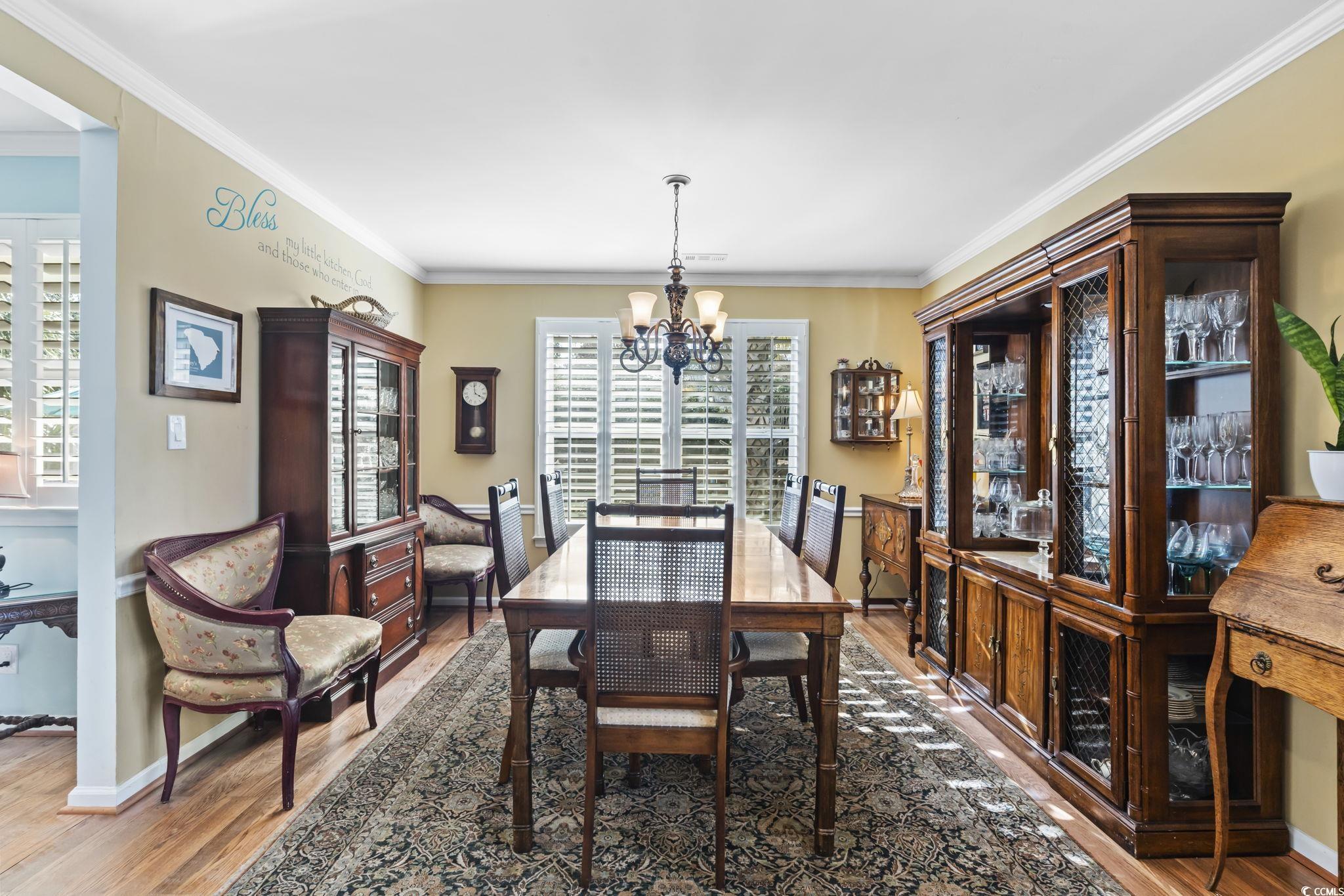 1671 Arundel Road Myrtle Beach, SC 29577 - Photo 27 of 40 Dining space featuring hardwood / wood-style floor