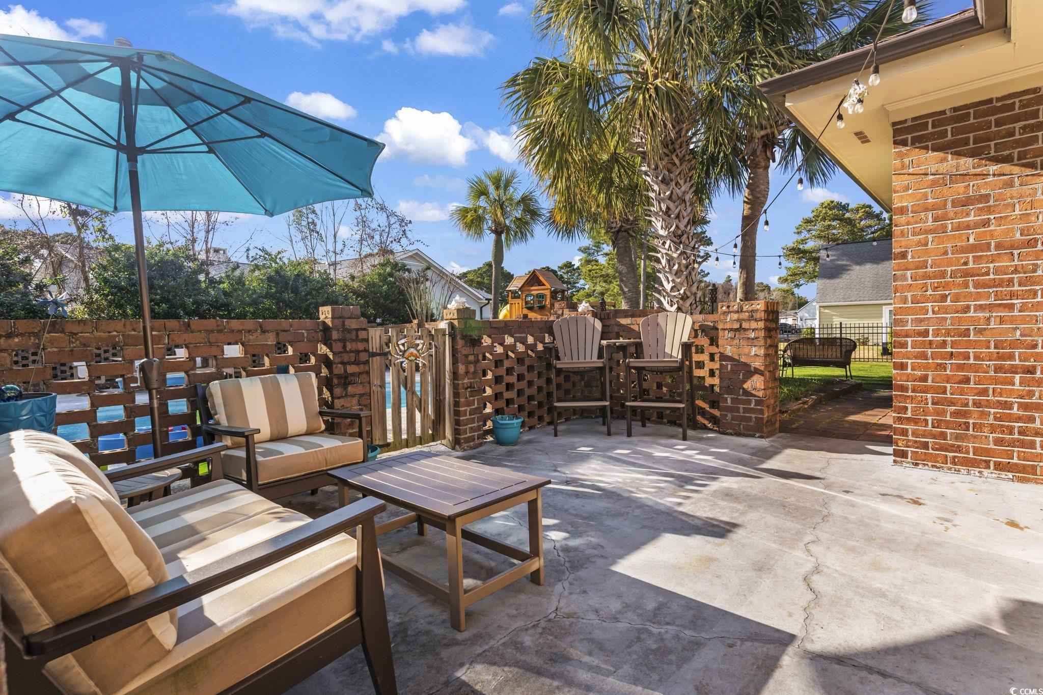 1671 Arundel Road Myrtle Beach, SC 29577 - Photo 30 of 40 View of patio with an outdoor living space