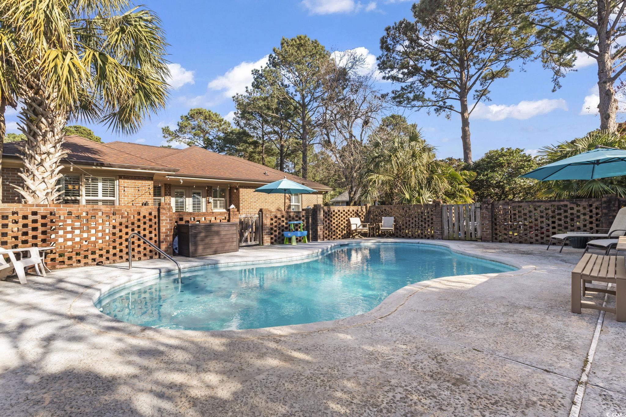 1671 Arundel Road Myrtle Beach, SC 29577 - Photo 34 of 40 View of swimming pool featuring a patio area