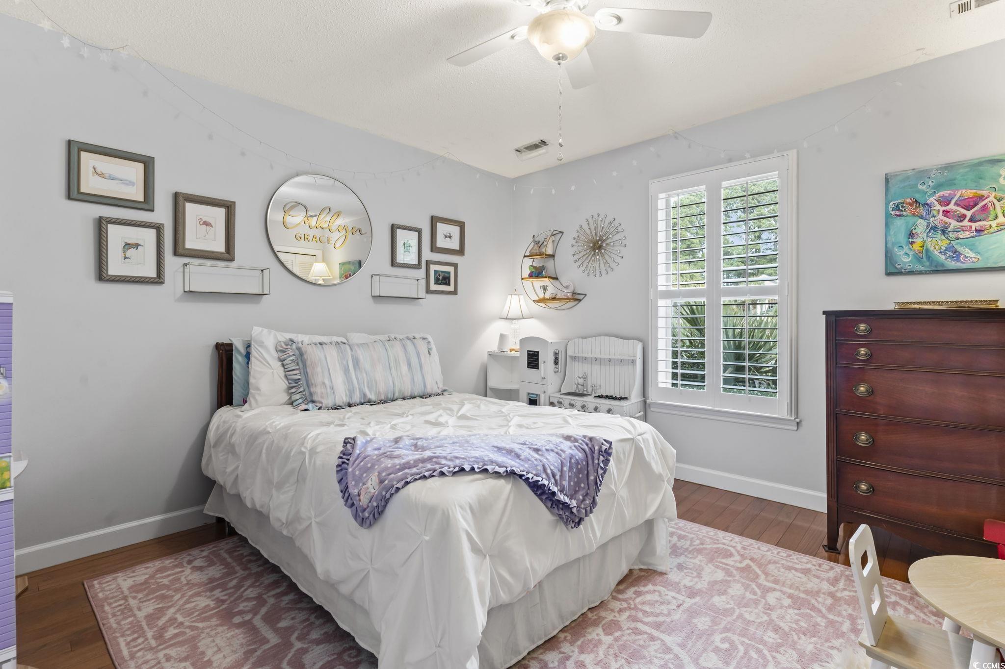 1671 Arundel Road Myrtle Beach, SC 29577 - Photo 6 of 40 Bedroom with hardwood / wood-style floors and ceil