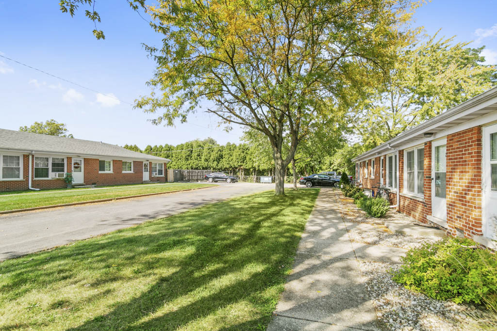 11212 1st Street, Unit 1 Mokena, IL 60448 - Photo 9 of 10 a view of a house with a yard